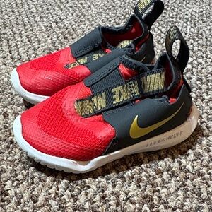 Nike Kids Red and Black Slip-On Sneakers with Gold Swoosh